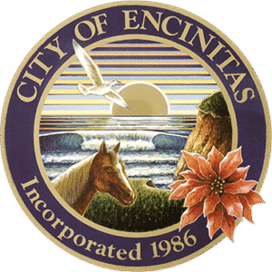 Encinitas city seal with horse, seagull, ocean waves, sunset, cliff, and poinsettia.